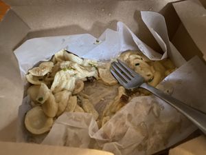 This is half eaten - creamy Mac!  at Breaking Waves Brewing in Silverdale