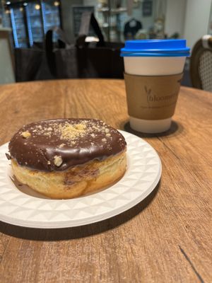 Bloomer’s BV Ferrero Rocher doughnut and a chai latte    at bloomer's - Bayview Village in Toronto