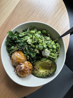 avacado bowl with kale salad and snap pea salad. Added yam falafel  at Tractor Foods in Victoria