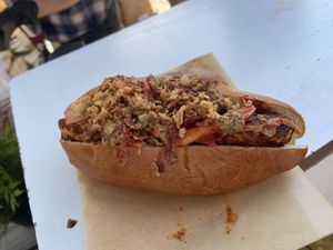 Clark fermentation: tempeh dog with kimchi and fried onions. Very good!  at Rotterdamse Oogstmarkt in Rotterdam