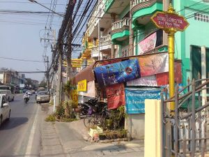 Street side view (note the Soi sign for directions) at Mee Mii in Chiang Rai