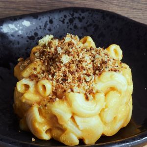 Penne pasta in a creamy cheese sauce, topped with crispy breadcrumbs.
 at Leaf Lovers in Birmingham
