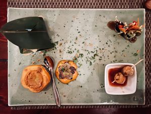 Kale dumplings, stuffed persimmon, tofu ball sticks, eggplant rolls   at HanGawi in New York City