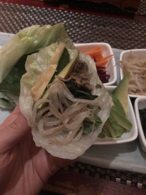 *Ssam bab (do it yourself, lettuce and sesame leaves wrap with variety of vegetables, sautéed mushrooms and bean paste sauce, served with 3 kinds of rice )  at HanGawi in New York City