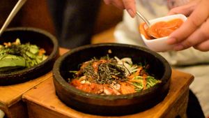 Bibimbap being cooked at table at HanGawi in New York City