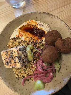 Hummus & broken falafel bowl with tofu   at Caravan in North London