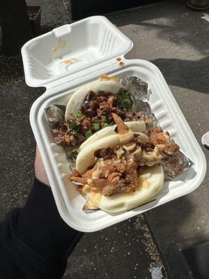 Top is duck bao bun bottom is fried oyster mushroom bao bun  at Mama Dut in Portland