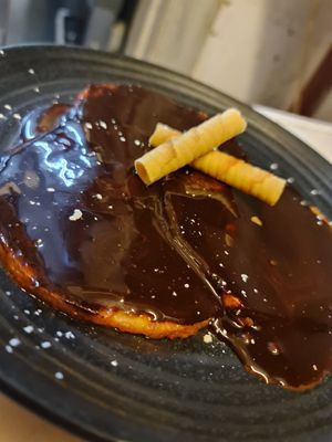 piña marinada asada con chocolate especiado at Zelaik Gastrobar in Pamplona