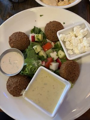 Falafel salad….dressings and cheese on the side are not vegan….  at Lebanese Taverna in Arlington