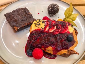 Tahini bar, energy ball and nutty banana bread topped with homemade peanut butter and jam  at Breens Deli in Mallorca