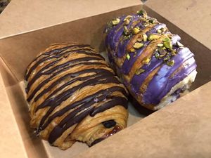 Chocolate Croissant (l) and the special mini loaf with Japanese sweet purple yam.  at SPLIT Bakehouse in La Mesa