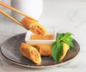 Crispy spring rolls with vegan fish sauce at Khoe in Vancouver