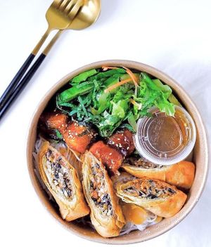 Khoe Bowl - a vermicelli bowl featuring crispy spring rolls. at Khoe in Vancouver