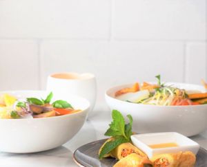 Vegan pho, Bun bo Hue and a side of spring rolls at Khoe in Vancouver