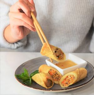Crispy spring rolls with vegan fish sauce at Khoe in Vancouver