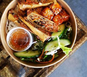Khoe Bowl - vermicelli salad bowl with vegan spring rolls & glazed tofu  at Khoe in Vancouver