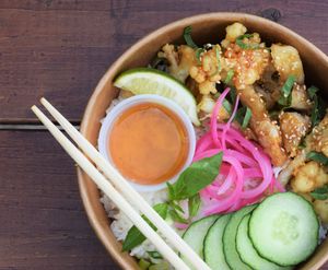 Cauli Rice Bowl - battered cauliflowered and mushroom served on rice  at Khoe in Vancouver
