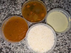 Rice, coconut chutney, spicy sambar, and tomato chutney at Mint Indian Bistro - Spring Valley in Las Vegas