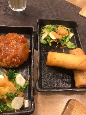 Vegan Hamburger and vegan spring rolls. at KITCHEN & BAR Prana in Sakaishi