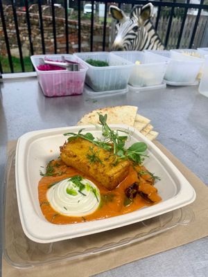 Eggplant braised in tomato and chilli sugo with polenta and cashew cream
 at Twinkle Town  in Port Douglas