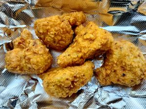 Buffalo Chick'N "Drumsticks" Made using Fresh Cauliflower! Seasoned, Battered, fried and then tossed with our house made Buffalo Sauce at Our Vegan Corner in Syracuse