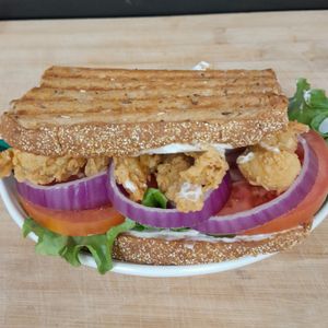 Under Pressure. Panini style sandwich available in 3 styles served on NY Style Rye Bread, hot pressed on the grill. (Shown in Chick'n style) (Soy-Free, Dairy-free) at Our Vegan Corner in Syracuse