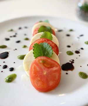 Caprese Salad (house made vegan cheese) at Origin Cafe in Noord