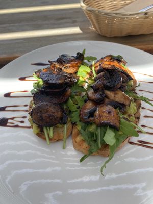 Mushroom avocado toast  at Origin Cafe in Noord