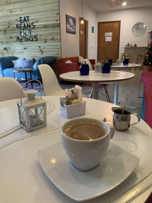 Coffee with oat milk   at Origin Cafe in Noord