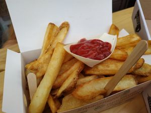 Fries (big portion) with ketchup in a take-out box. at Vegánsky Gazda in Trencin