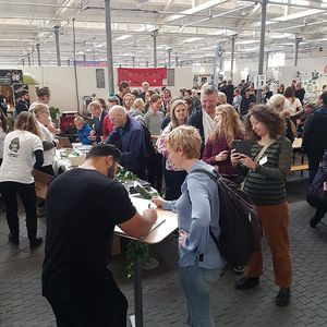 Patrik Baboumian signing books at VeggieWorld in Copenhagen, 2019. at Vegetarian Society of Denmark in Copenhagen