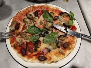 Vegan pizza with eggplant, olive, mushrooms and pepper. So yummy!   at Pizza Express - Central in Hong Kong Island