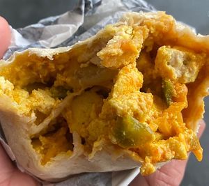 Up close of buffalo breakfast burrito (made with tofu)   at Minglewood Bake Shop in Richmond