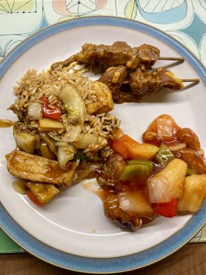 Mix of sweet and sour, satay skewers and special fried rice   at Lee's Kitchen in Bedford