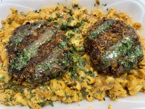 Crab cakes over Mac n chz  at KraVegan in Jacksonville