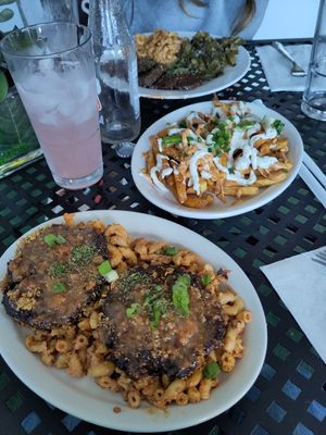 Signature Krab (Hearts of Palm, Artichoke Bottoms, Mushrooms) 
over infamous Mac N'Cheeze

 and KraCheezy Fries at KraVegan in Jacksonville