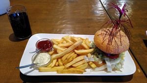 Vegan Chili Burger with fries at Vegan Food Bar in Almere