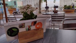 Outdoor seating along bike path at Vegan Food Bar in Almere