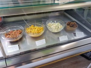 Daily salads and sides at La Línea Verde in La Linea De La Concepcion