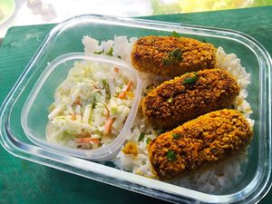 Chickpea-carrot nuggets with basmati rice and coleslaw
 at La Línea Verde in La Linea De La Concepcion