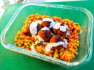 Keftedes (Greek carrot-walnut balls) with tomato-garlic rice at La Línea Verde in La Linea De La Concepcion