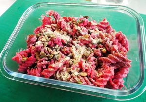 Pinky pasta salad (from beetroot) with roasted seeds and vegan parmesan at La Línea Verde in La Linea De La Concepcion