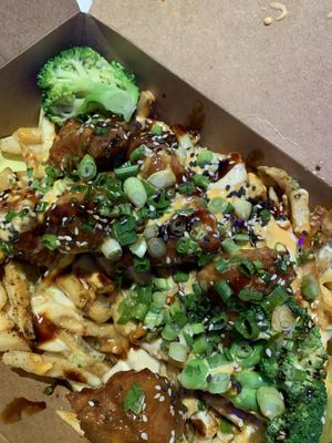 Veg chicken over fries  at Naughty Vegan Panda in Pasadena