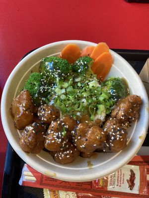 Orange cauliflower bowl   at Naughty Vegan Panda in Pasadena