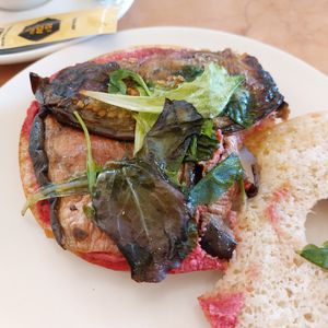 Vegan bagel with aubergine, pink hummus at Antico Caffè San Marco in Trieste