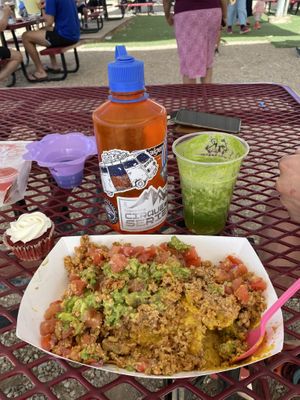 Nachos & green smoothie. Nalgene for size. The nachos were much prettier when served. I tried one & dove right in, forgetting to take a pic until I came back up for air. YUM! at Moab Rainbowls in Moab