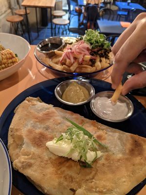 indian creppe and fries with smoked tofu in the back at Peaches Gastro Girls in Warsaw