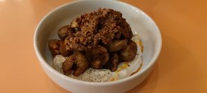 Crispy potato with sour cream and minced topping at Peaches Gastro Girls in Warsaw