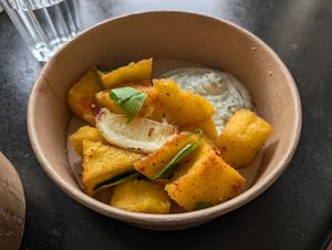 Fried polenta with a tasty creamy dip at Peaches Gastro Girls in Warsaw