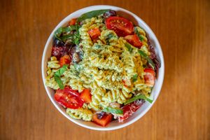 Spinach Artichoke Pasta Salad at New World Kitchen in Des Moines